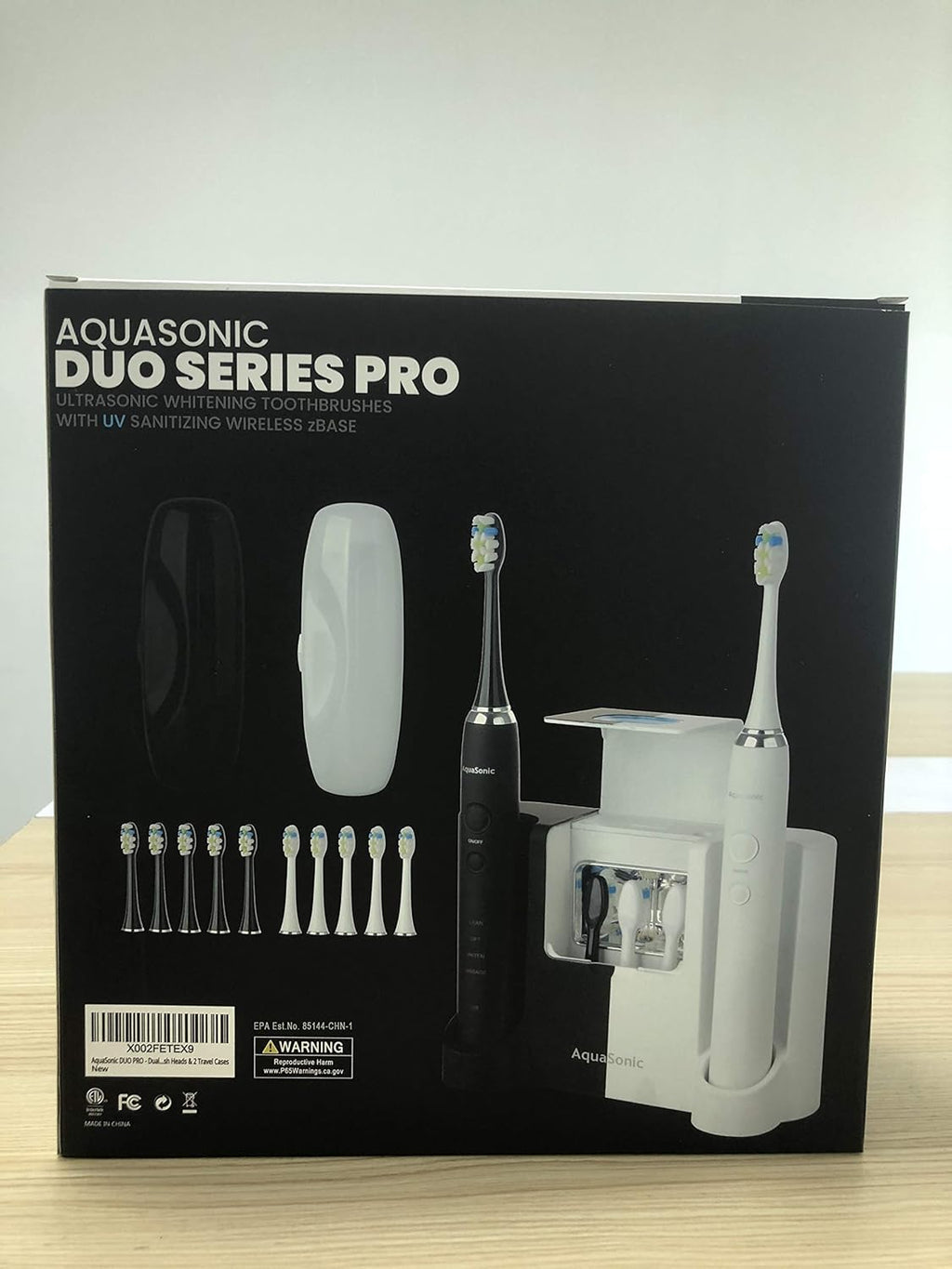 Electric Smart Toothbrush with UV Sanitizing Charging Base, 10 Brush Heads, 2 Travel Cases, Pack of 2 Q59347